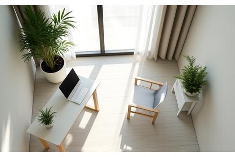 A bright, minimalist home office in Miami with sunlight filtering through, featuring an ergonomic chair, a compact standing desk, and a healthy plant, demonstrating space-saving and wellness-focused design.